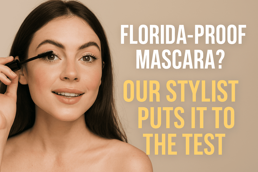 Smiling young woman applying mascara with bold text reading ‘Florida-Proof Mascara? Our Stylist Puts It to the Test’ on a beige background.