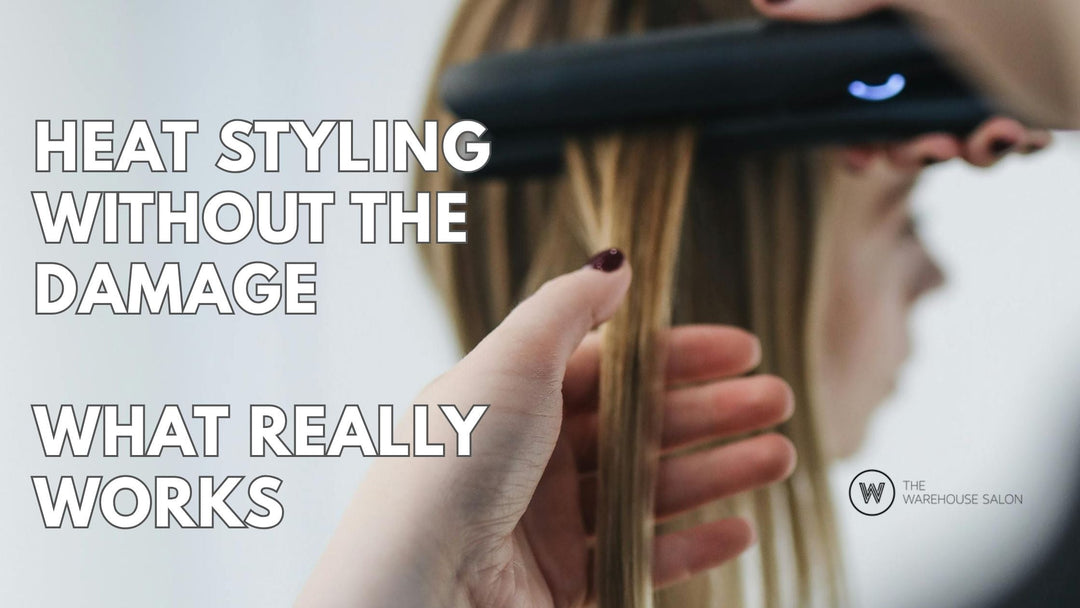 Flat iron styling smooth brunette hair in a salon with heat protectant spray nearby.